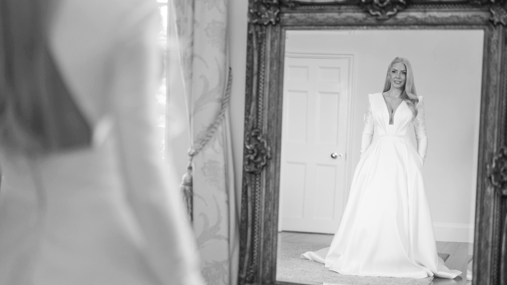 Botleys Mansion - Bride looking in mirror