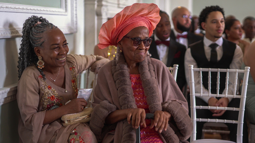 Botleys Mansion Wedding Ceremony - Guests catch glimpse of bride