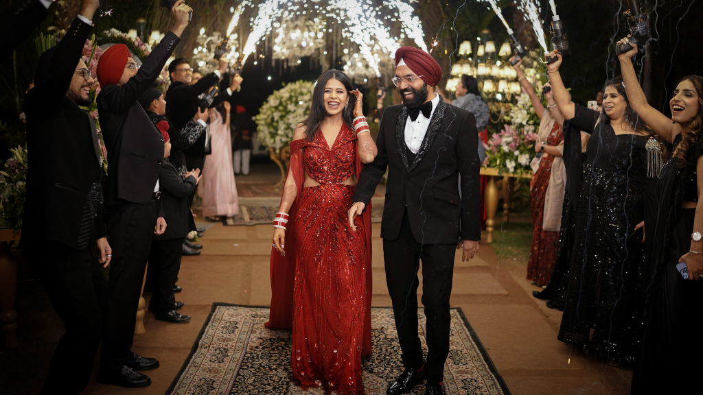 Indian wedding couple fireworks exit