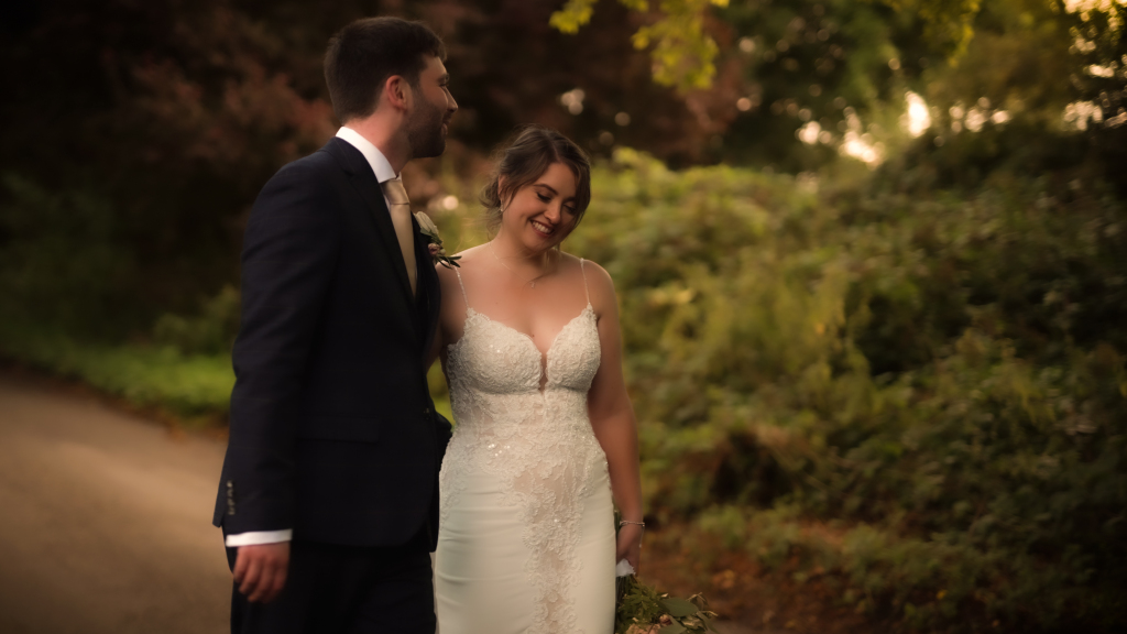Wedding couple shoot on country lane leading to Lains Barn