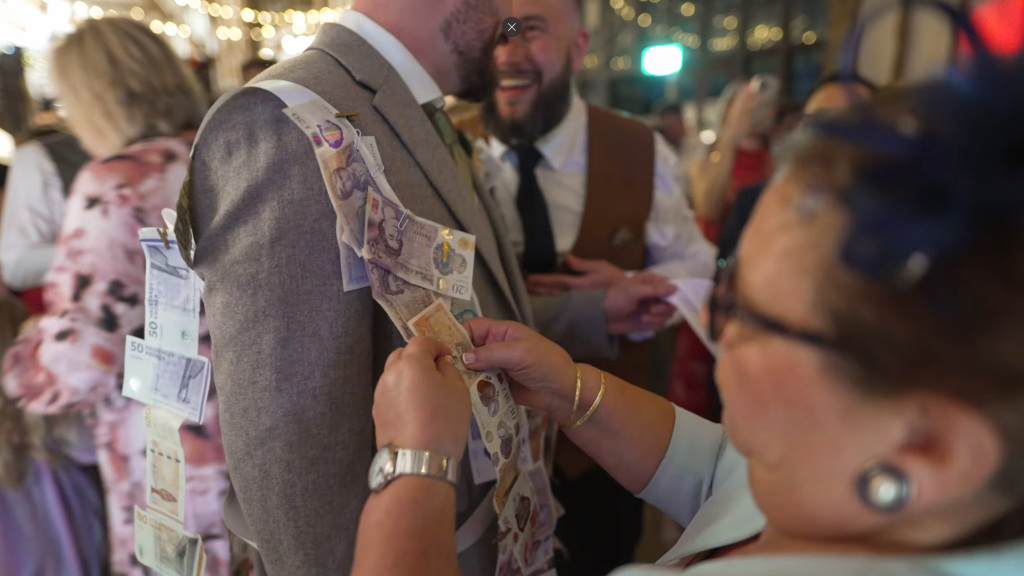 Kalamatiano, or money dance, celebrated at a Greek wedding in London